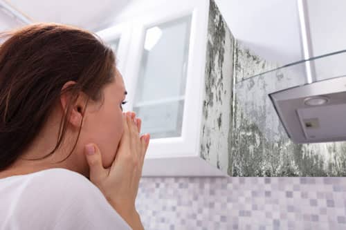 woman finding mold