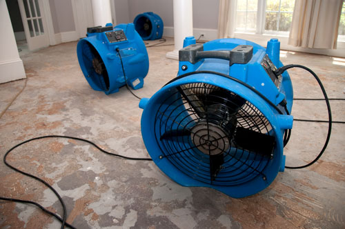 fans drying out a home from water damage