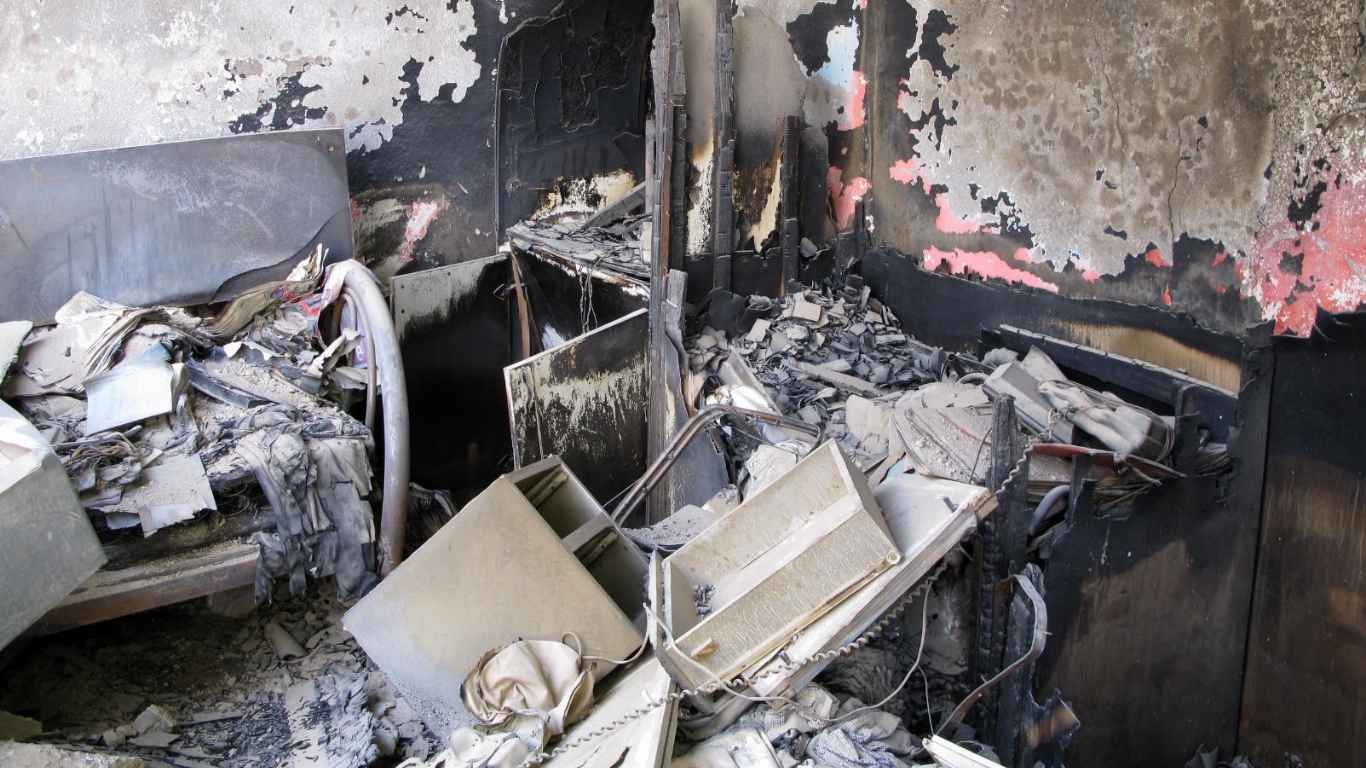 Charred room debris needing fire damage restoration in Newport